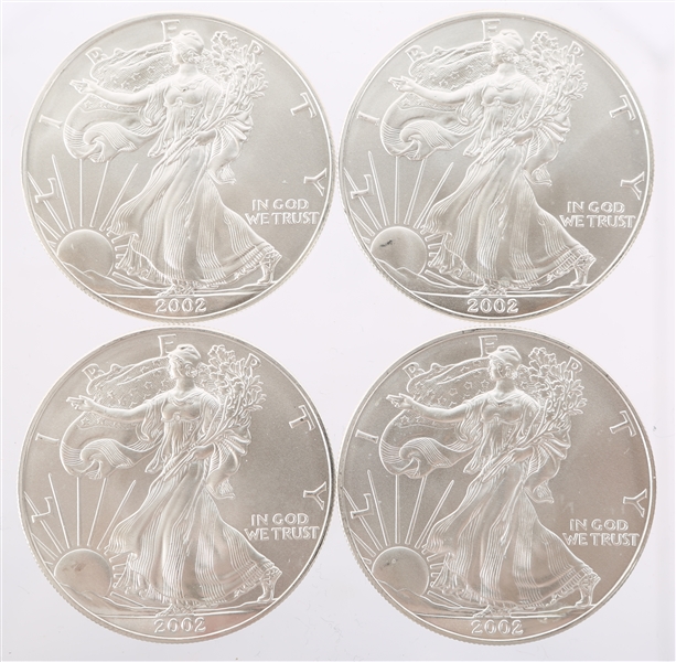2002 UNITED STATES SILVER AMERICAN EAGLES - LOT OF 4