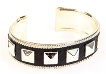 SILVER TONE CUFF BRACELET WITH LEATHER INLAY