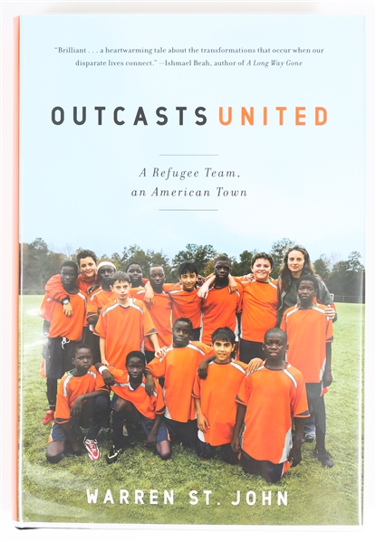 SIGNED FIRST EDITION: ST. JOHN, WARREN | Outcasts United. Spiegel & Grau, 2009