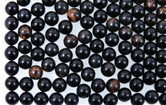 20TH C. OPAQUE BLACK MARBLES 