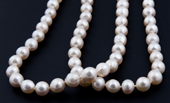STRAND OF BAROQUE PEARLS WITH 14K YELLOW GOLD CLASP