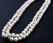 STRAND OF BAROQUE PEARLS WITH 14K YELLOW GOLD CLASP
