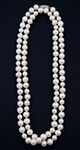 STRAND OF BAROQUE PEARLS WITH 14K YELLOW GOLD CLASP