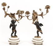 PAIR OF BRONZE WINGED CHERUB CANDELABRA