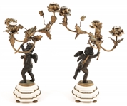 PAIR OF BRONZE WINGED CHERUB CANDELABRA