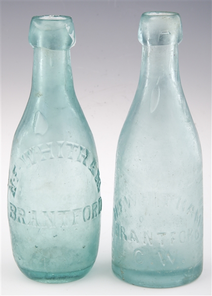 LATE 19TH CENTURY H.F. WHITHAM GLASS BOTTLES - LOT OF 2
