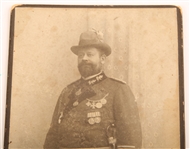19TH C. CABINET CARD OF A DECORATED GERMAN HUNTER