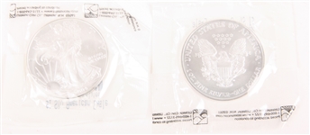 2004 .999 FINE AMERICAN SILVER EAGLES - LOT OF 2
