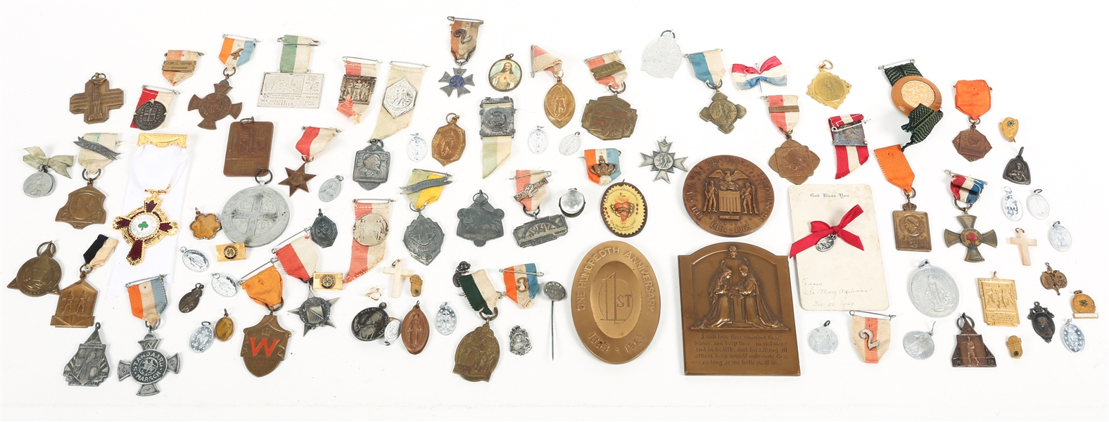 INTERNATIONAL MEDALS, PINS, PENDANTS, AND CHARMS