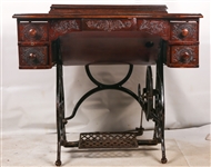 EARLY 20TH C. TREADLE SEWING MACHINES & WOOD CABINET