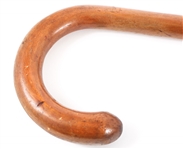 THREE WOODEN CROOK HANDLED CANES 