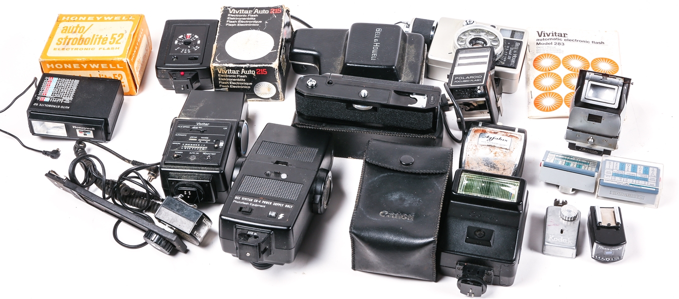 CAMERA FLASHES & ACCESS. CANON, VIVITAR, HOWELL & MORE