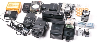 CAMERA FLASHES & ACCESS. CANON, VIVITAR, HOWELL & MORE