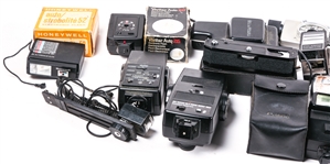 CAMERA FLASHES & ACCESS. CANON, VIVITAR, HOWELL & MORE