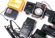 CAMERA FLASHES & ACCESS. CANON, VIVITAR, HOWELL & MORE