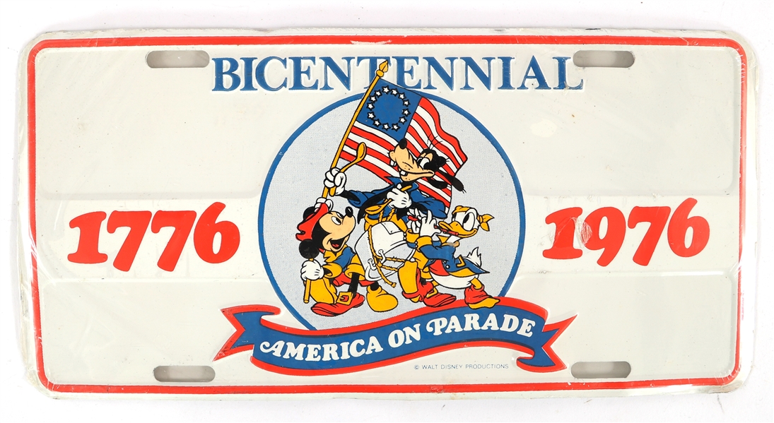 1976 WALT DISNEY AMERICA ON PARADE LICENSE PLATE