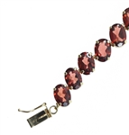 14K YELLOW GOLD GARNET BRACELET
