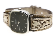 SEIKO WRISTWATCH WITH MEXICAN STERLING SILVER CUFF