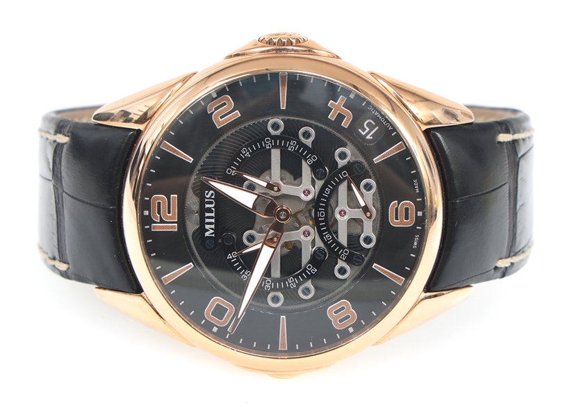 MILUS TIRION TRI-RETROGRADE 18K GOLD CASE WRISTWATCH