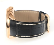 MILUS TIRION TRI-RETROGRADE 18K GOLD CASE WRISTWATCH