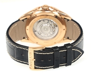MILUS TIRION TRI-RETROGRADE 18K GOLD CASE WRISTWATCH