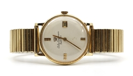 JULES JURGENSEN 14K GOLD CASE MECHANICAL WRISTWATCH