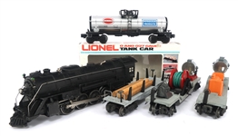 LIONEL LOCOMOTIVE, TANKER, SEARCHLIGHTS, AND LOG TRUCK