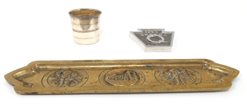 TRAVEL CUP, GOLD-TONED BRASS TRAY, AND PAPERWEIGHT