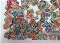 20TH C. INTERNATIONAL LOOSE POSTAGE STAMPS