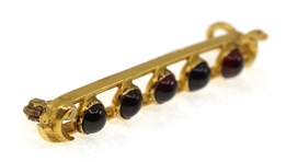 14K YELLOW GOLD CABOCHON GARNET BROOCH